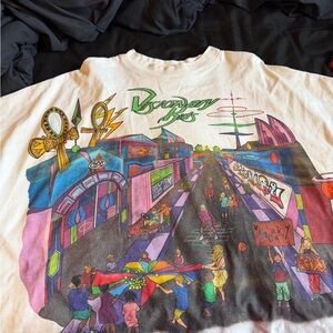 Vintage Graphic Tee with Colorful Street Scene